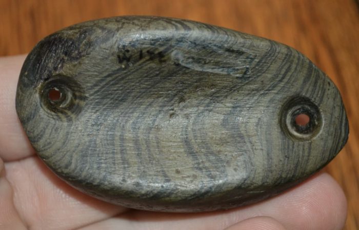 Woodland cupped and drilled boatstone
